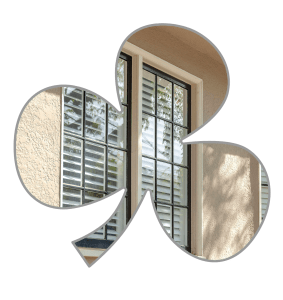 A shamrock outline with a widows picture shown inside of it