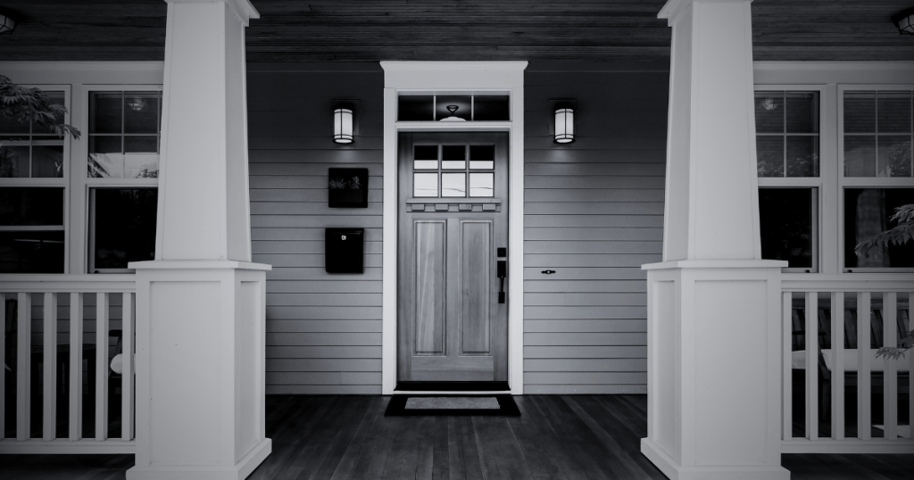 A spooky front door to a home.